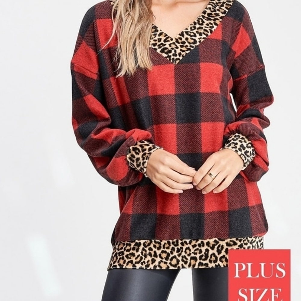 Red and black plaid sweater left!